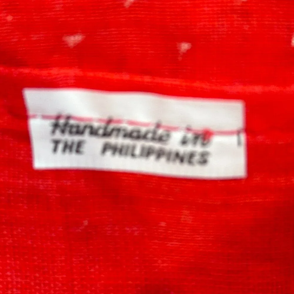 Source Unknown red plastic